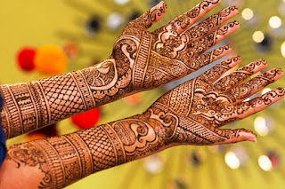 Gujarati bridal mehndi inspired by rangoli design