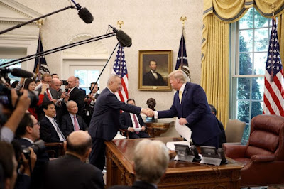 President Trump with Chinese Vice Premier Liu He on Friday. Photo: Win McNamee/Getty Images 