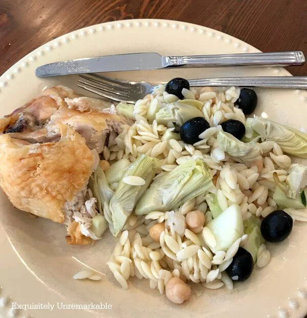 Orzo Salad Side Dish on a plate with chicken