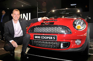 mini cooper s launching in india with model sitting