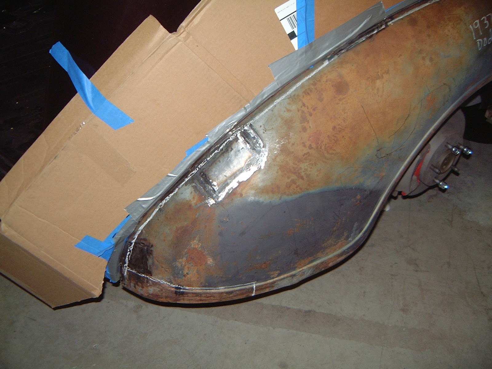 1937 Plymouth I mounted the fenders and marked the cut line.