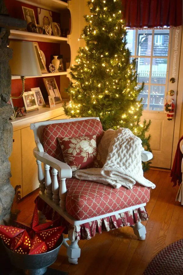 Cottage Style Christmas Chair with skirt in front of lighted tree