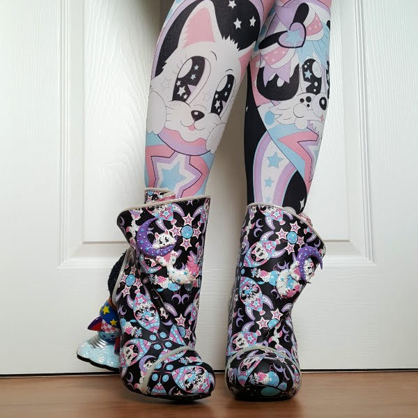 wearing cat and dog space tights with matching ankle boots