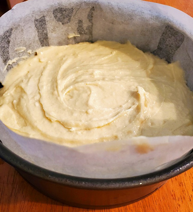 this is cake batter for lemon cake from scratch in a springform pan