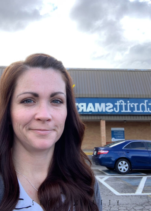 Thrift store haul for March - Woman standing in front of Thrift Smart thrift store in Nashville