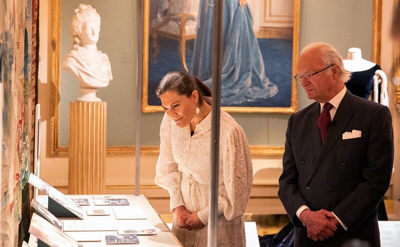 Queen Silvia and Princess Christina. Crown Princess Victoria wore a sheer lace shirt dress and baroque pearl earrings from Cravingfor