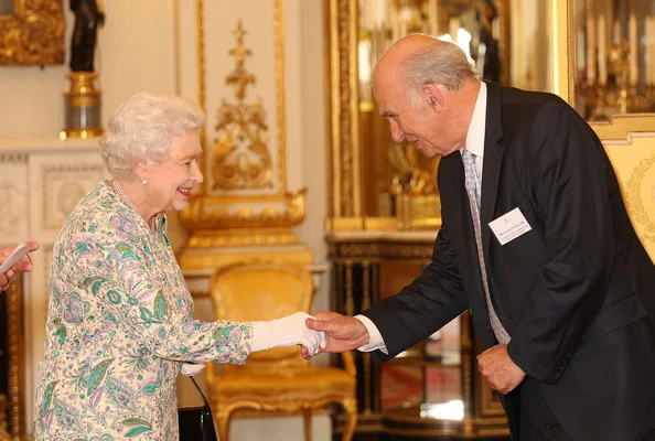 Queen Elizabeth attended a reception for the Winners of the Queens Award for Enterprise 2013 at Buckingham Palace