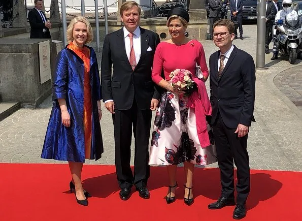 Queen Maxima wore NATAN floral skirt and pink top. Minister-President Manuela Schwesig and her husband Stefan in Schwerin