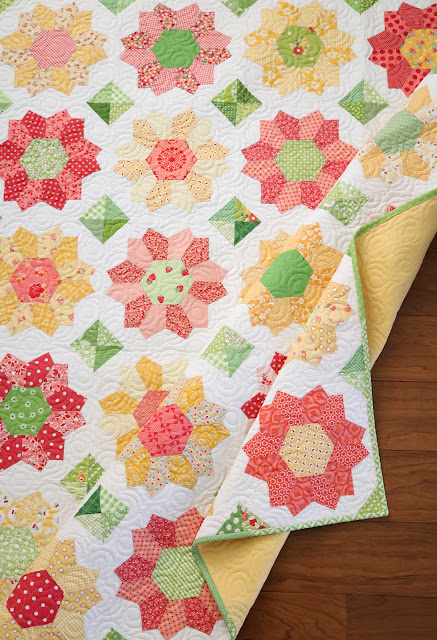 Dahlia quilt - an english paper pieced quilt by Andy of A Bright Corner.  A great scrap quilt using Playing with Paper starter set 43 by Sue Daley Designs