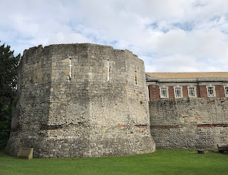 A picture of a large and angular old tower that was part of the Roman fortress of Eboracum, now central York.  Photo by Kevin Nosferatu for the Skulferatu Project.