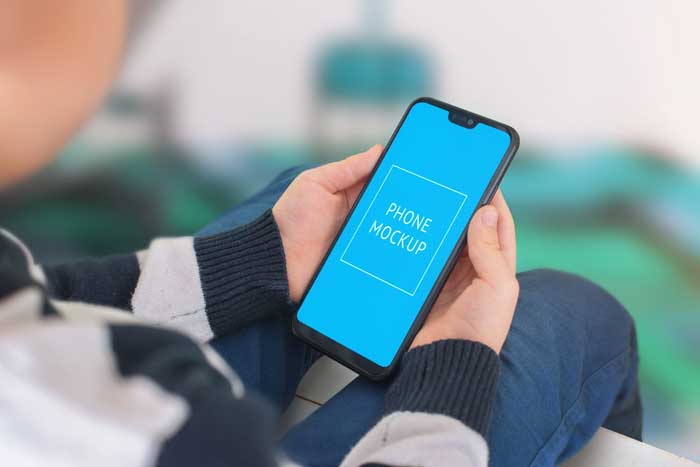 Modern Smart Phone In Kid Hands Phone Mockup Modern Smart Phone In Kid Hands Mockup