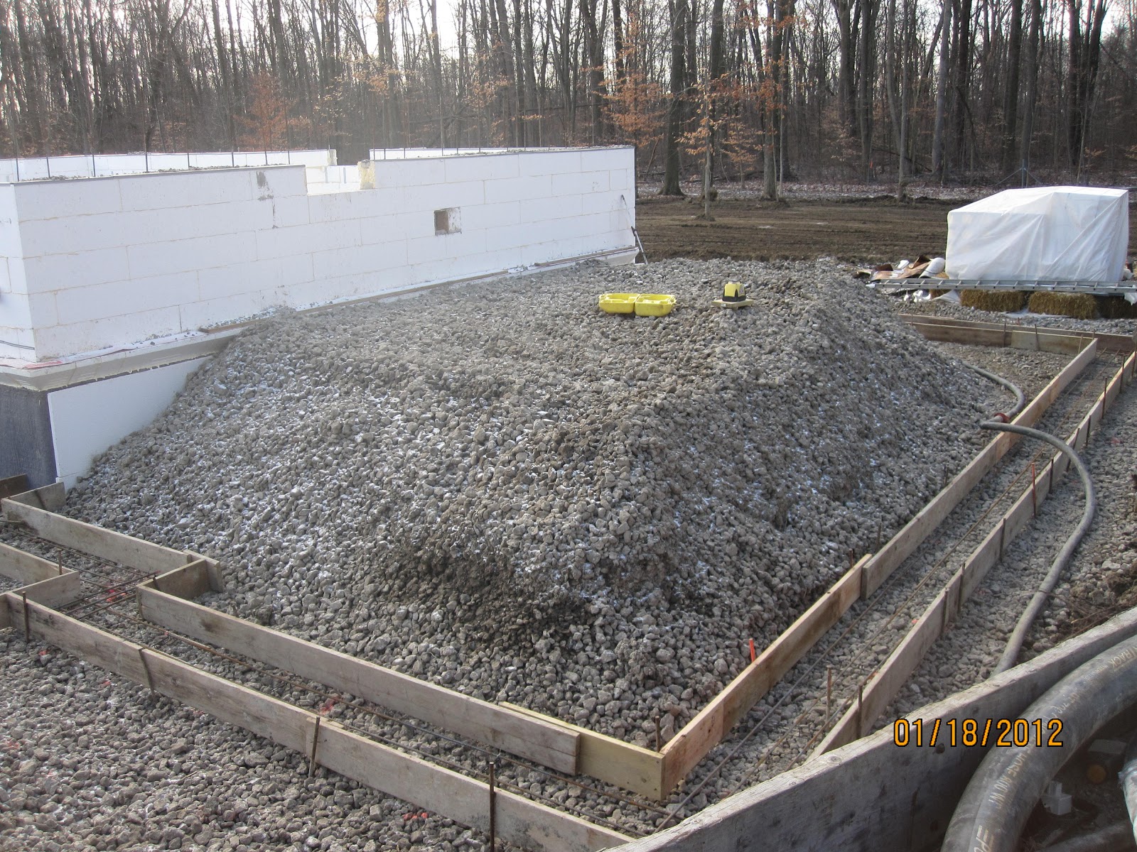 Energy Efficient Building Network Placing Concrete In Garage Footings
