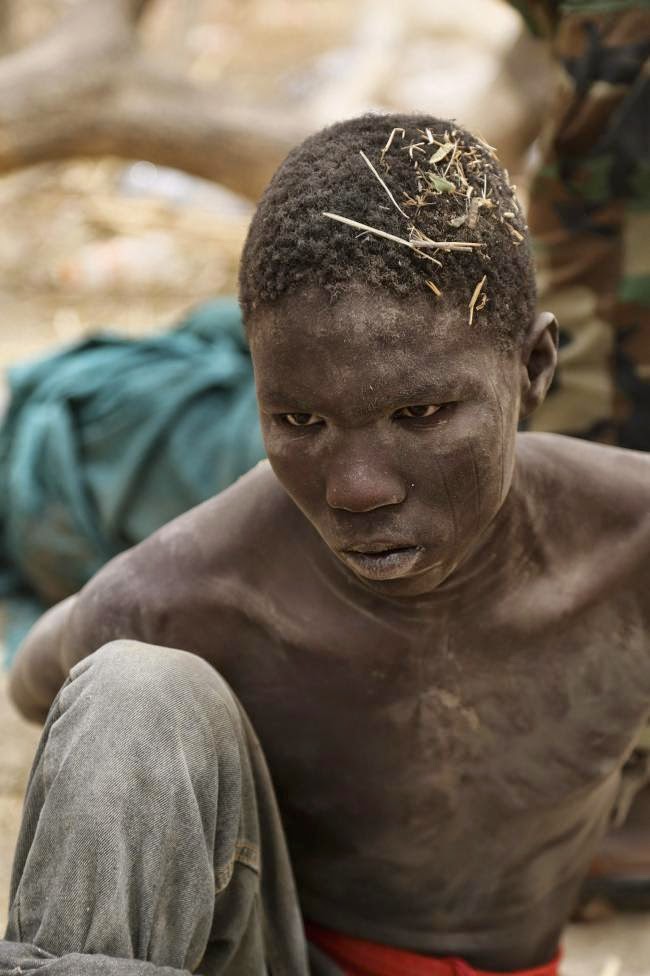 1 Photos of captured Boko Haram members