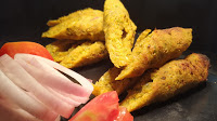 Serving veg Seekh kabab pieces with onion slices