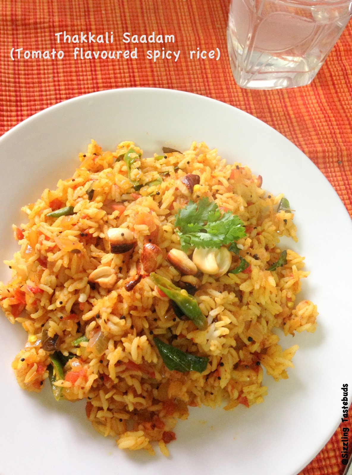 Sizzling Tastebuds Thakkali Saadam How to make spicy tomato rice