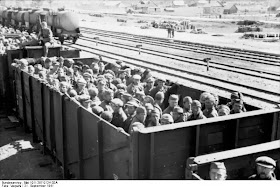 Soviet prisoner herded in cattle trains