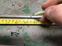 Marking location on the rod to cut