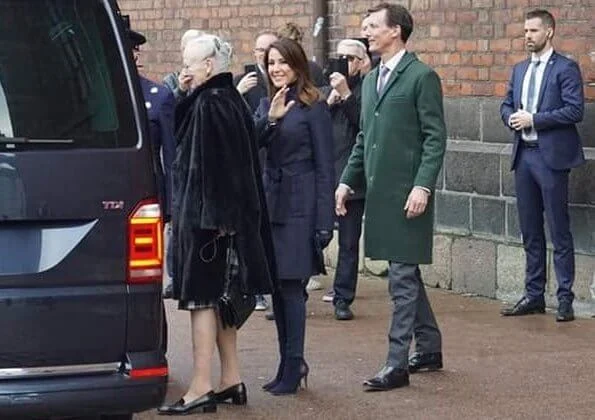 Crown Princess Mary. Princess Marie wore Hugo Boss Casenosa tie-waist coat in Italian virgin wool with cashmere in navy