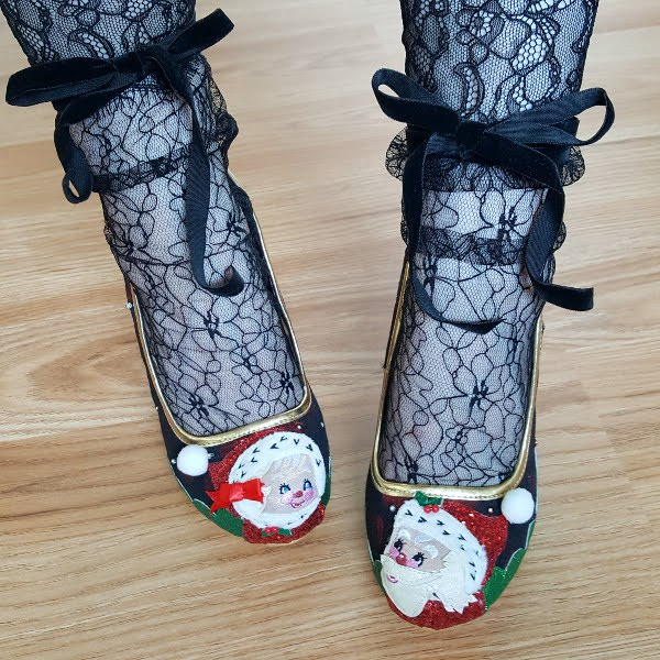 wearing Mr & Mrs Claus shoes with lace socks