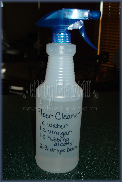 spray bottle with recipe for floor cleaner written on it