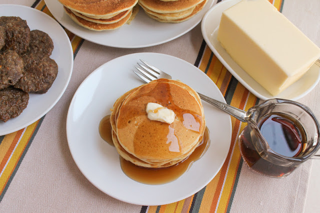 Food Lust People Love: These easy sourdough pancakes use sourdough discard to add lots of flavor and baking powder and soda for rise so they can be cooked immediately. Serve with lashings of butter and syrup!