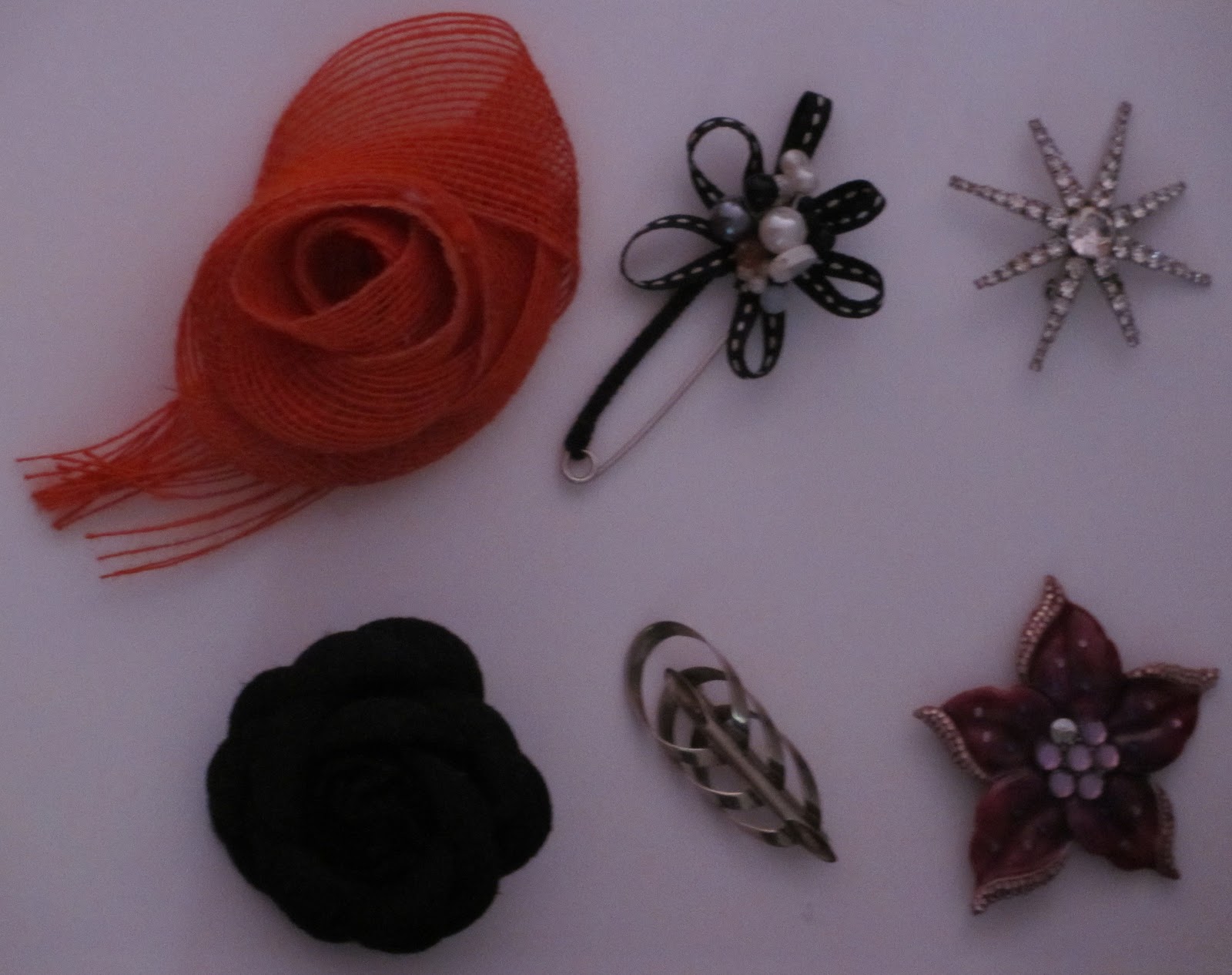 Over 60 and over here! Dare I broach the subject of brooches?