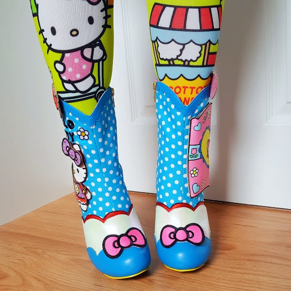 front view wearing polka dot boots with Hello Kitty bows
