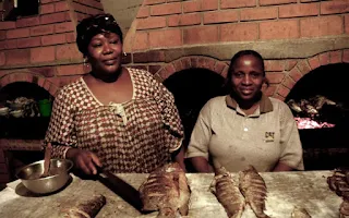 Cooking fish in Cameroon Africa.