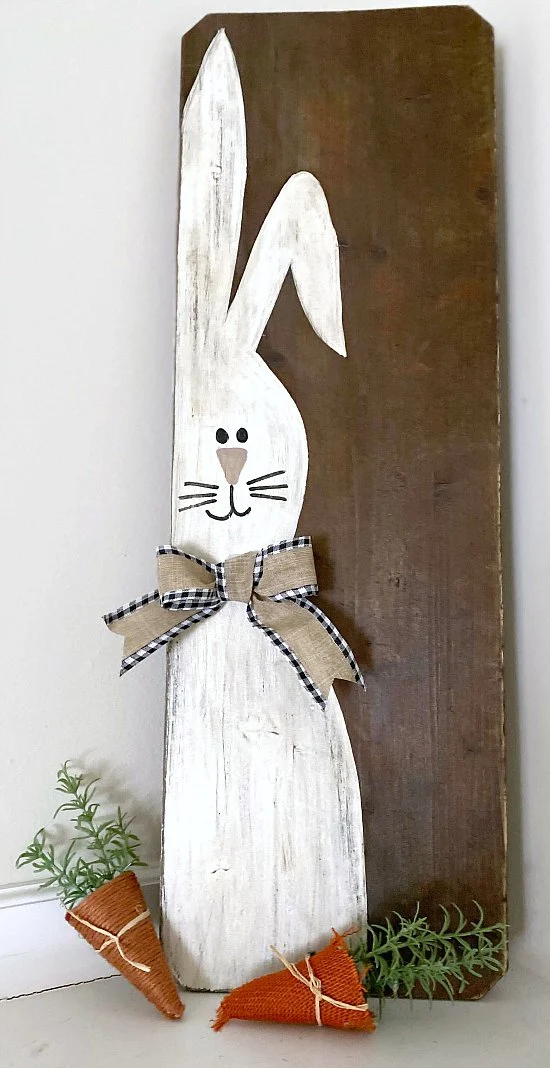 Painted bunny sign with bow and carrots