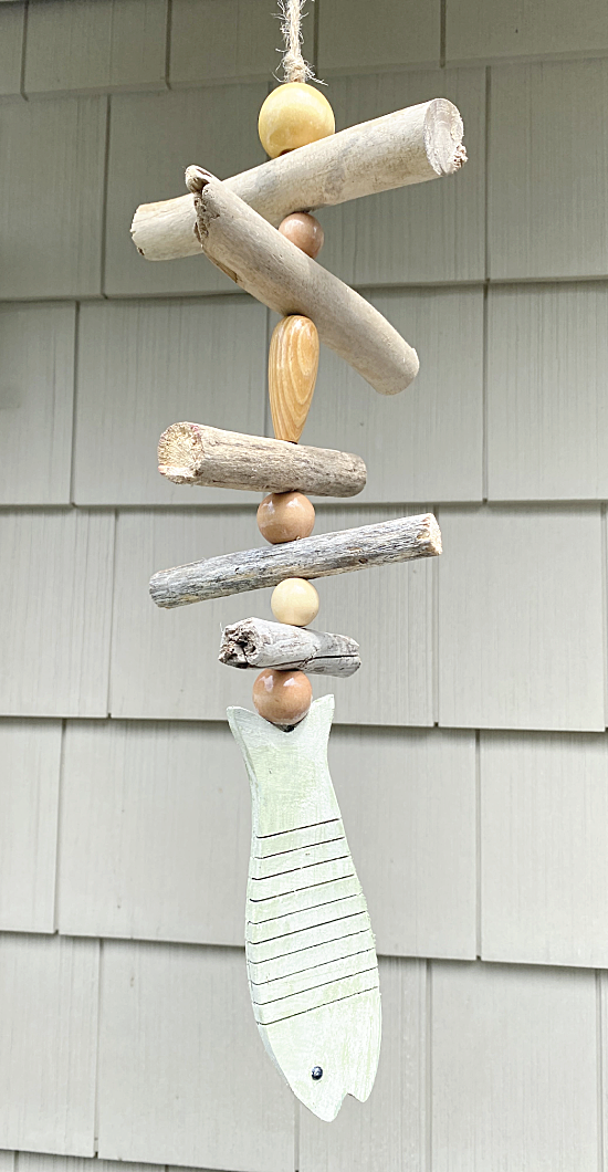 driftwood and bead mobile with a fish