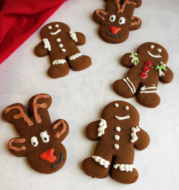 It is always fun to have a cookie cut in a pretty shaped and decorated with frosting, but you aren't limited to sugar cookies. There are lots of flavors and types of cookies you can roll and cut, here are a few of our favorite recipes. gingerbread men and reindeer decorated with royal icing