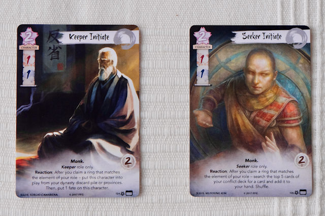Winning 2nd or 3rd round got you the Keeper Initiate, winning 4th or 5th round got you the Seeker Initiate Alternate Art cards of Seeker Initiate and Keeper Initiate