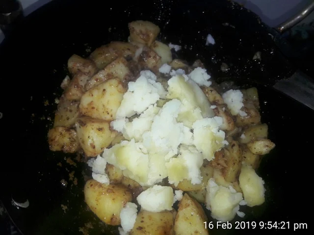 stir-to-combine-well-fried-potatoes