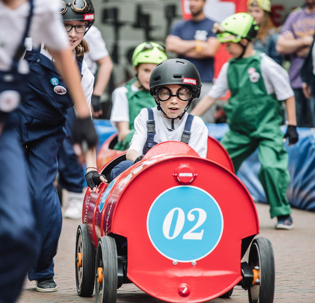 Just A Car Guy Motul brought eight pedal cars made from oil drums for