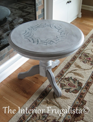 Round pedestal table After with painted medallion graphic