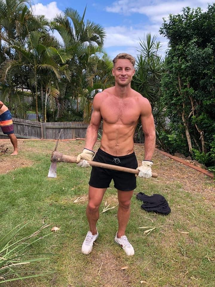 strong-bare-chest-blond-guy-backyard-wor