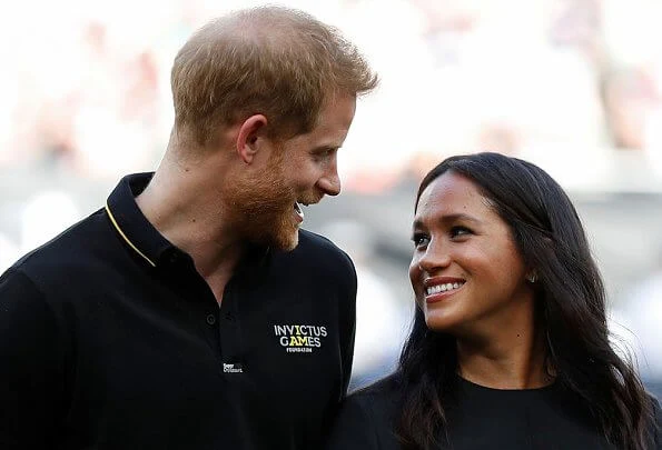 Meghan Markle wore  Customized Stella McCartney dress, and Aquazzura Deneuve flats, Jennifer Meyer Turquoise earrings