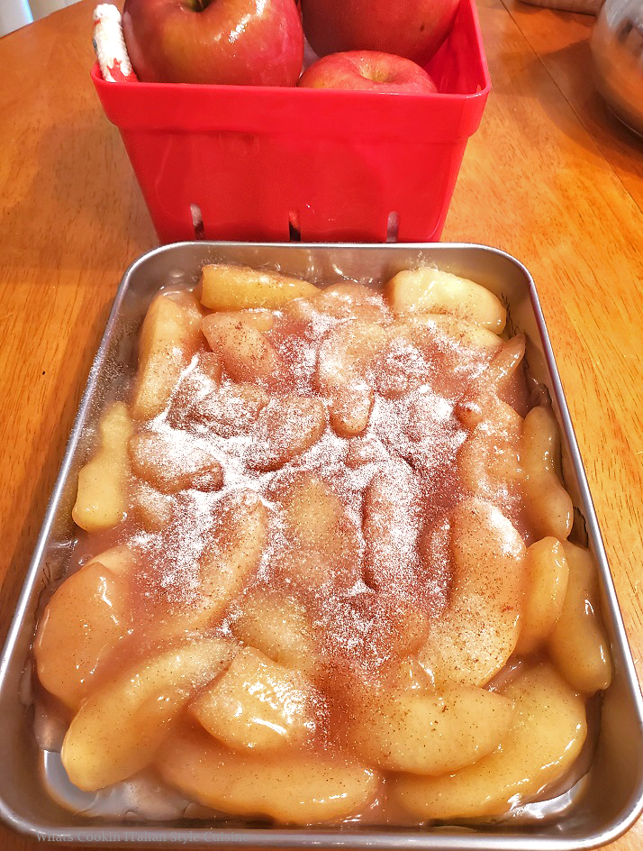 this is a pan of country style sliced apples ready to be baked