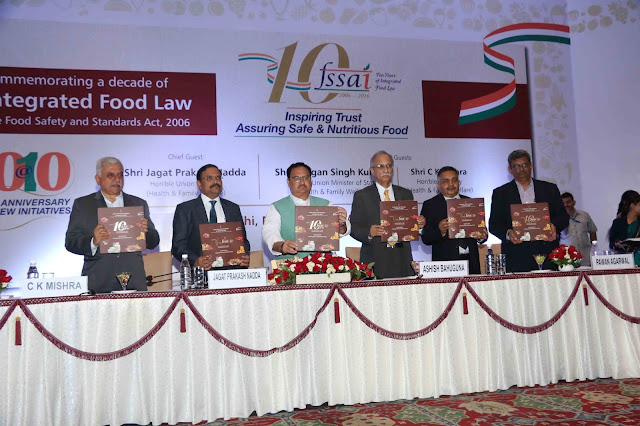 Unveiling the Coffee Table Book – Shri Shri J P Nadda, Honourable Union Minister of Health & Family Welfare, Shri C K Mishra, Secretary, Ministry of Health & Family Welfare, Shri Pawan Agarwal, CEO, Food Safety & Standards Authority of India(FSSAI), Shri Ashish Bahuguna, Chairperson, FSSAI, Shri Faggan Singh Kulaste, MoS of Health & Family Welfare Unveiling the Coffee Table Book – Shri Shri J P Nadda, Honourable Union Minister of Health & Family Welfare, Shri C K Mishra, Secretary, Ministry of Health & Family Welfare, Shri Pawan Agarwal, CEO, Food Safety & Standards Authority of India(FSSAI), Shri Ashish Bahuguna, Chairperson, FSSAI, Shri Faggan Singh Kulaste, MoS of Health & Family Welfare