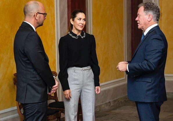 Crown Princess Mary wore a new crystal-collar crepe top from Red Valentino. Minister for Development Aid Rasmus Prehn.  UN World Food Programme