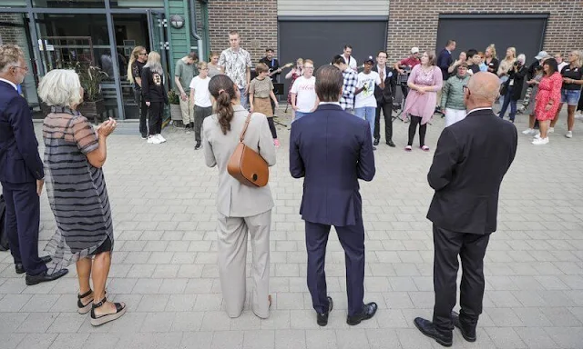 Crown Princess Victoria carried Little Liffner crossbody bag. Crown Princess Victoria wore blazer and pants from By Malina