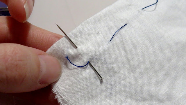 Alfiler en perpendicular a hilos flojos
