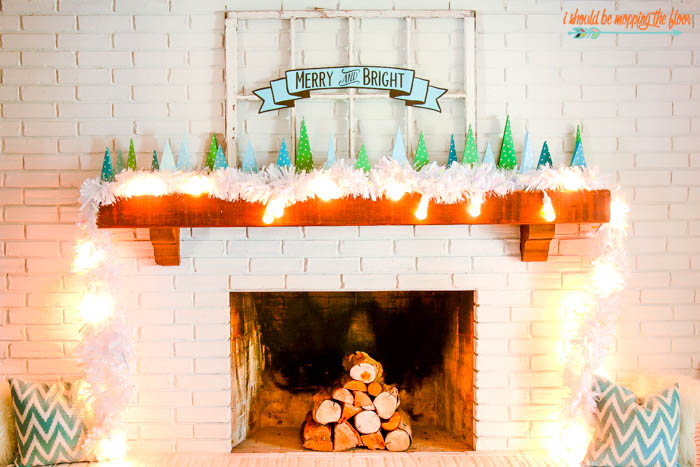 This Christmas Mantel Decor is full of bright lights and fun details!