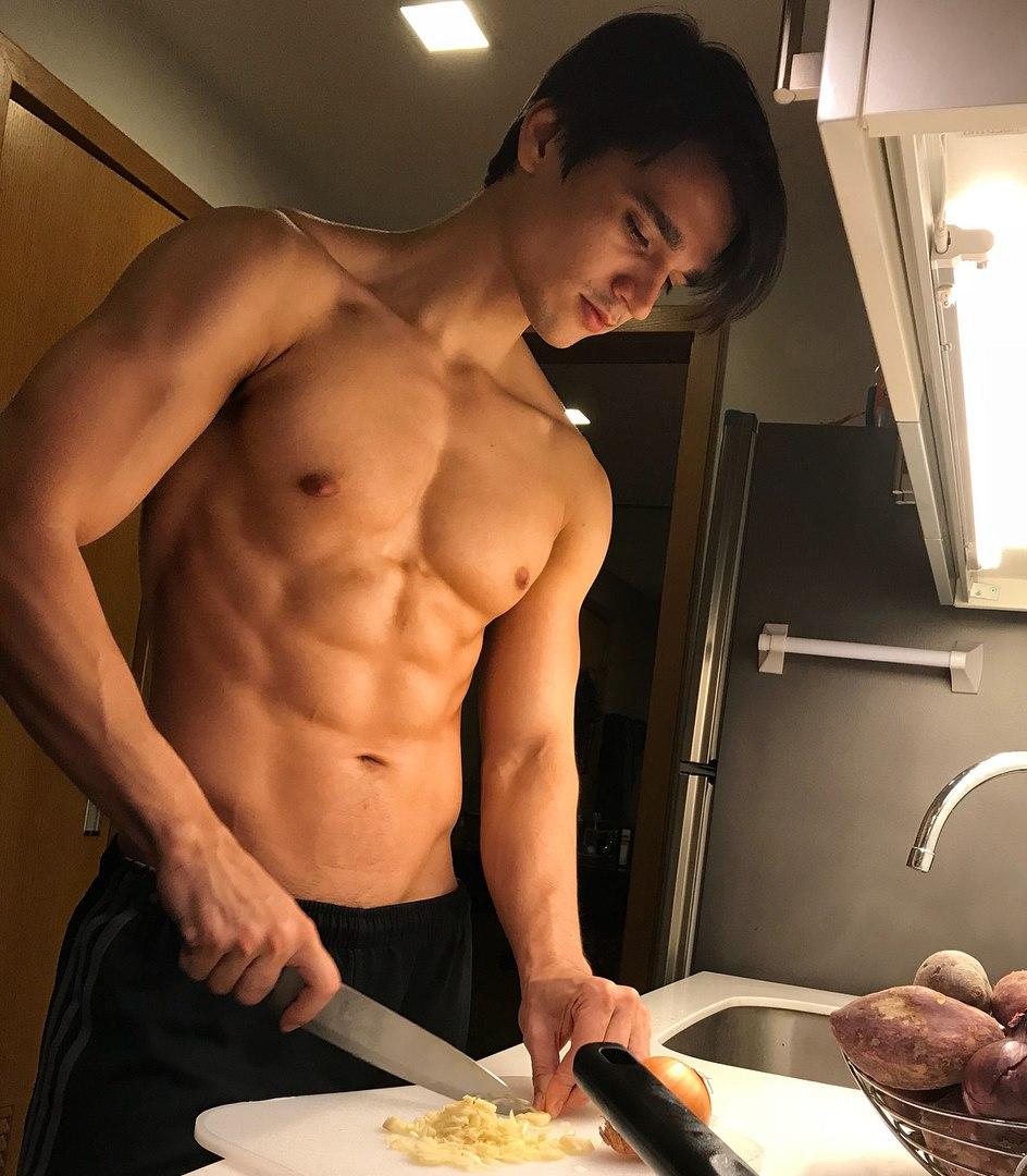 cute-young-shirtless-fit-guy-preparing-food-kitchen-sexy-cook