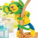 http://www.topcrochetpatterns.com/images/uploads/pattern/Amigurumi-monkey-toy.pdf