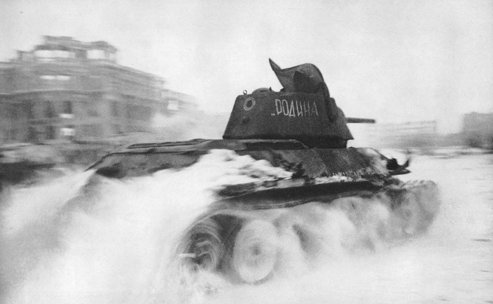 In January of 1943, a Soviet T-34 tank roars through the Square of Fallen Fighters in Stalingrad. 