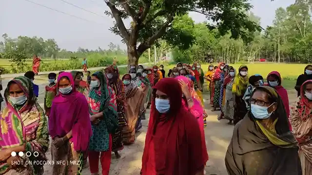 Distribution of Eid items of Passion for People in Bakshiganj