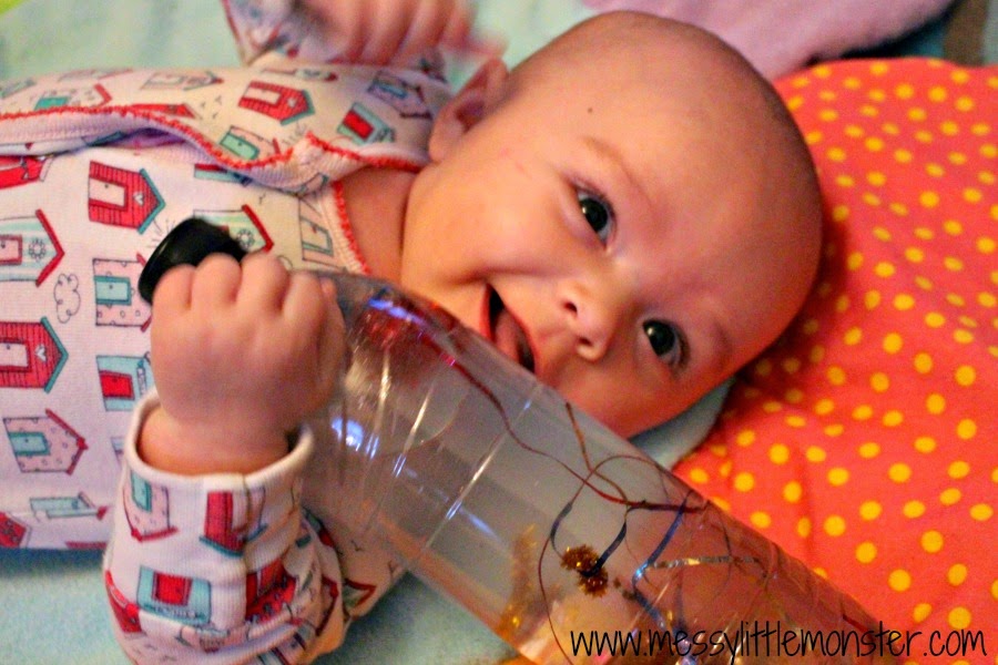 How to make a firework sensory bottle.  Activity ideas for babies and toddlers.  Great for bonfire night or new years eve celebrations.