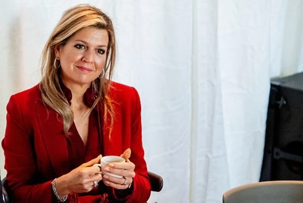 Queen Maxima wore a red blazer and trousers by Claes Iversen, and red blouse by Claes Iversen, with her L.K. Bennett pumps. at trade conference