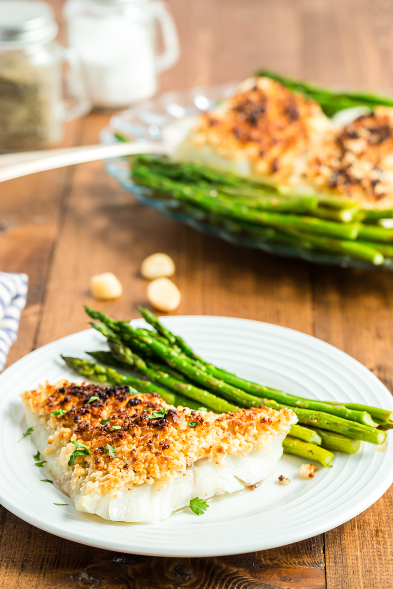 Oven Baked Coconut Macadamia Fish Fillets are a delicious fish recipe that is super simple, but fancy enough to impress company, and perfect for your low carb or keto lifestyle! The bonus is it can be made from start to finish in less than 30 minutes! #lowcarb #Keto #glutenfree #fish #cod #seafood #macadamia #coconut #sheetpan #easy #recipe | bobbiskozykitchen.com